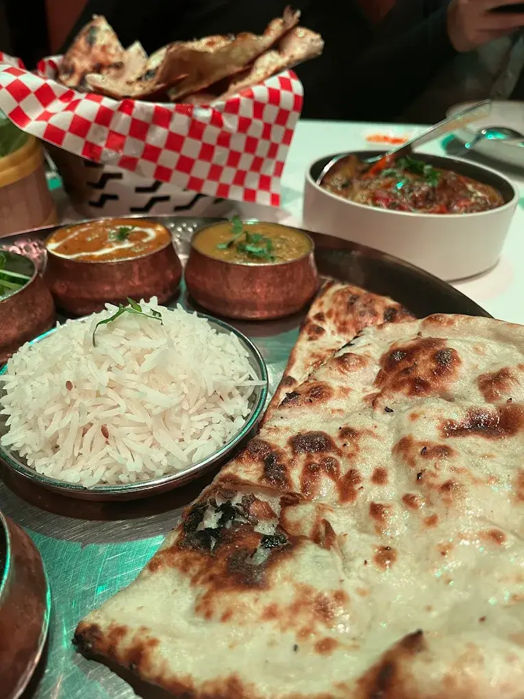 Traditional North Indian dishes including butter chicken and biryani at Aanchal Indian Restaurant & Bakery Griesbach Edmonton